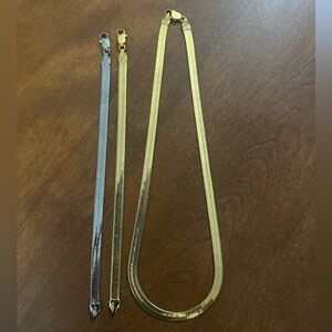 Gold tone Herringbone chain with matching bracelet in silver and gold tone